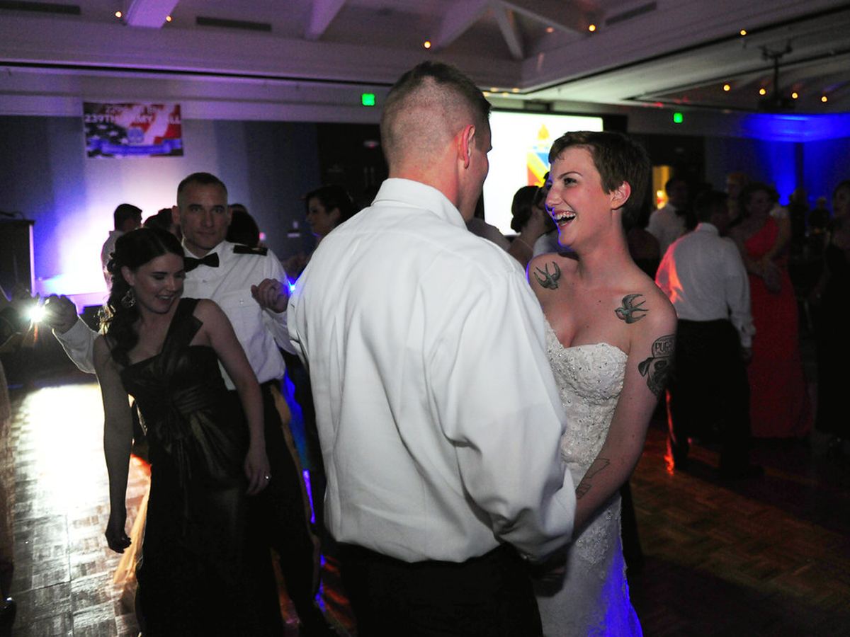 Guests enjoying an Iridescent Photo Booth at a weddings event